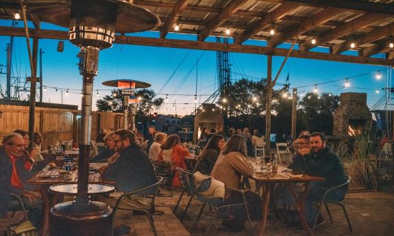 A crowd gathers at the Urban Asado on the weekend in St. Augustine.