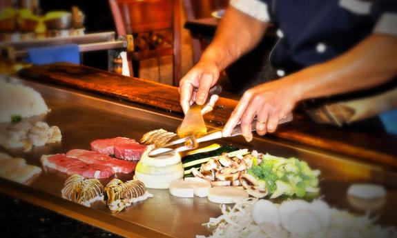 A chef working the habachi at Mikato in St. Augustine.