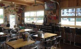 Obi's Fillin' Station is a vintage-car-themed beachside restaurant that serves burgers, beer and more.