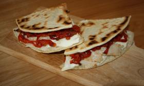 Dina's signature dish is the piadina, a handmade flatbread filled with imported Italian cheeses and meats, vegetables, and other fresh ingredients.
