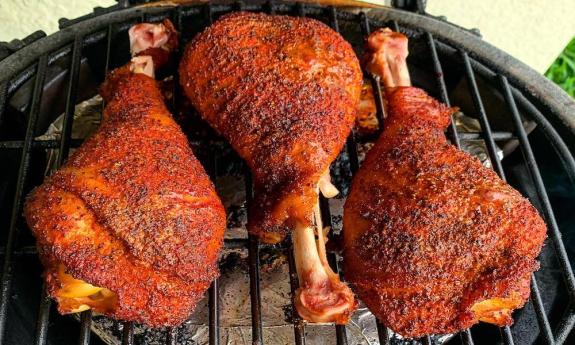 Meat being grilled and prepared to be served