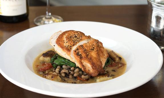 Black Hog Farm Chicken with Black-eyed peas at Preserved in St. Augustine.