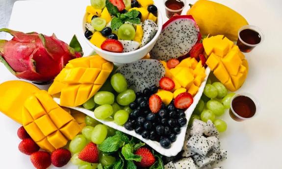 A Roots and Fruits Juicery salad on display.