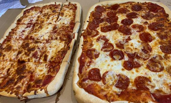 Cheese and pepperoni pizzas served from Sal's