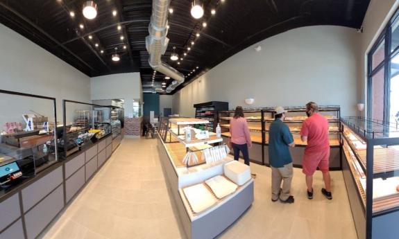 Selecting baked goods at Tidobeni Bakery in St. Johns, FL