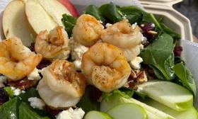 The autumn salad has apples, cranberries, and fresh shrimp — at Uptown Scratch Kitchen in St. Augustine.