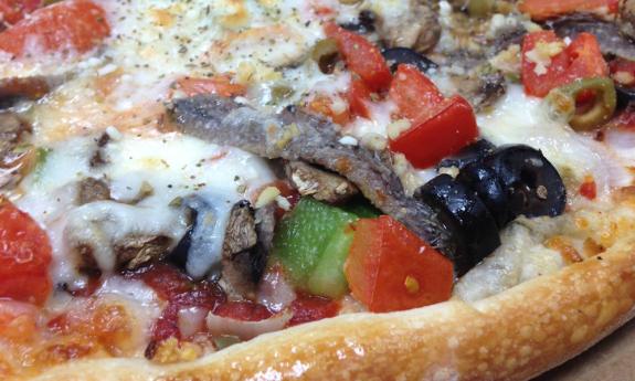 Pizza with everything at Vinny's New York Style Pizza in St. Augustine, Florida.