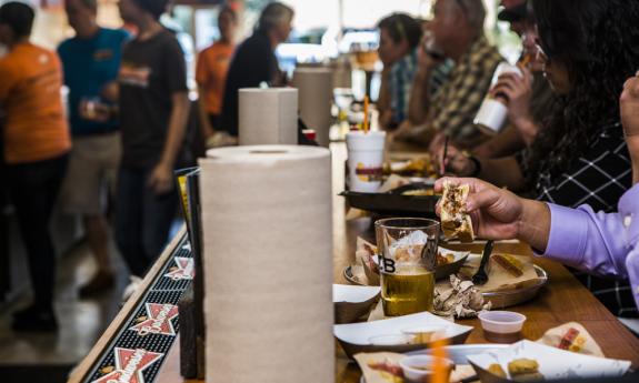 Guests eating barbeque at Willie Jewell's Old School Bar-B-Q