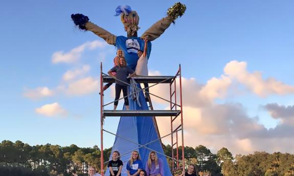 Building one of the burning man scarecrows at Rype & Readi Farm Market in Elkton, Florida.