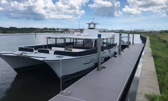 Sabrage on the dock at 117 Dockside Drive in St. Augustine.