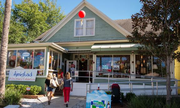 Shoppers enter Amistad, a fair trade retailer on San Marco Ave.