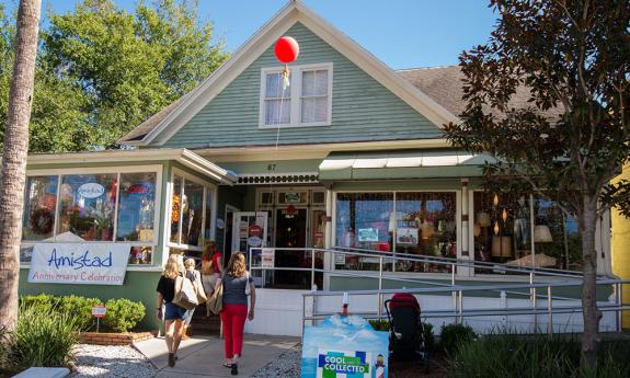 Shoppers enter Amistad, a fair trade retailer on San Marco Ave.