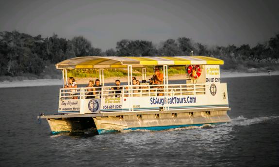 Visitors enjoying the views from the water on a St. Augustine Boat Tour.