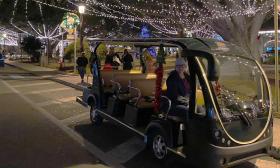 St. Augustine Land and Sea's electric vehicle at the Plaza during Nights of Lights in St. Augustine.
