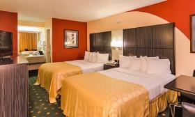 Comfortable beds and well-appointed decor in all guestrooms at the Best Western Spanish Quarter.