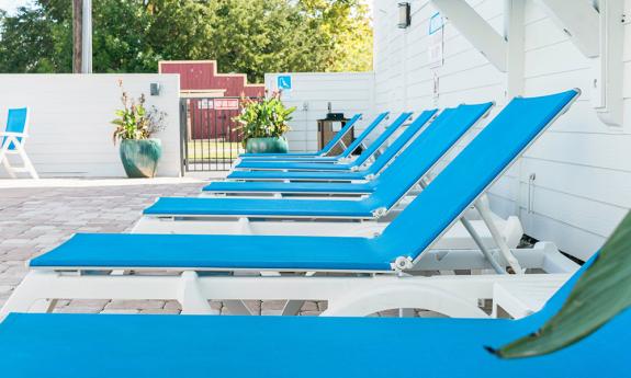 Comfortable chaise lounges around the pool at the Flagler Inn in St. Augustine.