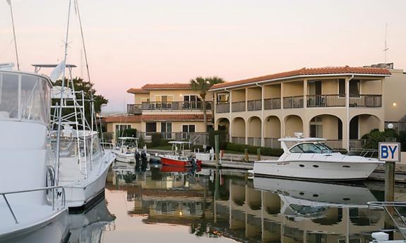 Harbor 26 overlooks the marina and rippling reflections in Camachee Yacht Harbor.