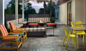 The fire pit and patio area at Home 2 Suites by Hilton in St. Augustine.