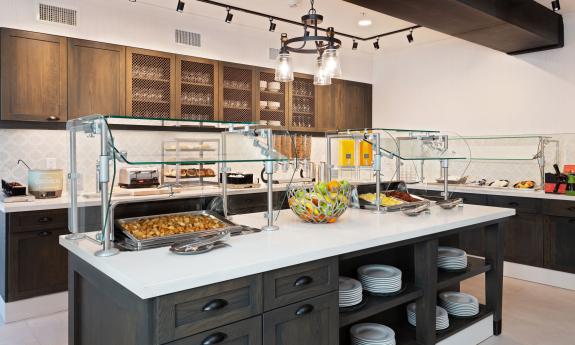 Breakfast and evening social hour begin in the kitchen area of Homewood Suites in St. Augustine.