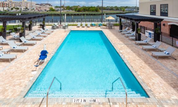 The pool from the upper patio and overlooking the San Sebastian River at Homewood Suites by Hilton in St. Augustine.