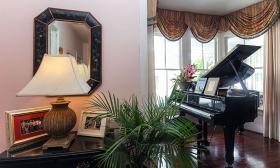Piano in the common room of the bed and breakfast. 