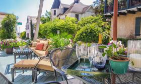 Enjoy a sunny afternoon on the patio of the Kenwood Inn.