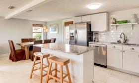 A kitchen in a beautiful vacation rental with Linda's Beach.