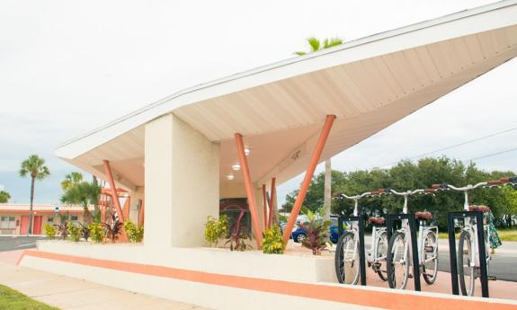 A fleet of bikes to borrow wait for guests of The Local - St. Augustine.