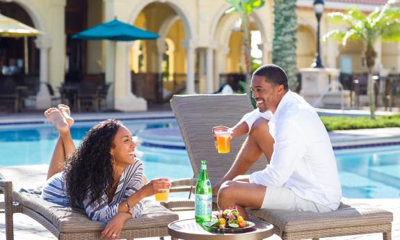 Sip drinks poolside at the Ocean Bar at Hammock Beach Golf Resort & Spa