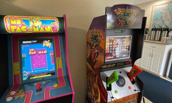 The lobby of Ocean Sands Beach Inn features a breakfast area and arcade games.