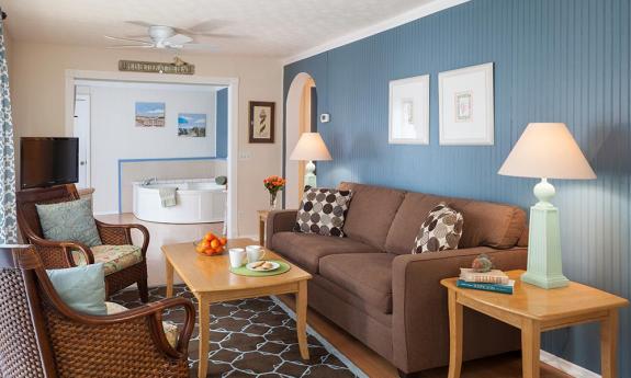 The living area with whirlpool alcove, at Beach Cottage, a beach vacation rental available through the St. Francis Inn in St. Augustine.