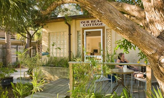 The tropical garden retreat at Beach Cottage, a beach vacation rental available through the St. Francis Inn in St. Augustine.