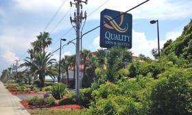 View of Quality Inn & Suites sign from A1A Beach Boulevard.