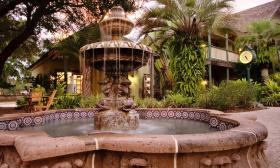 The courtyard at St. George Inn features beautiful, old world fountains. 