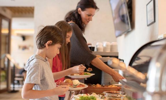 A family enjoying breakfast at Sebastian Hotel in St. Augustine.