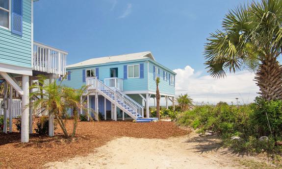 An exterior view of one of the beachside cottages at Beachcomber.