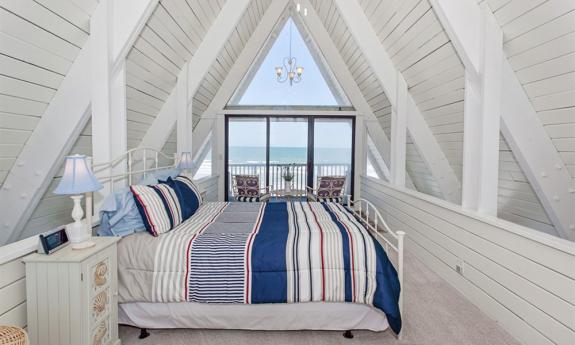 The A-frame Captain's Cottage offers ocean views in almost every room. Guests will not tire of waking up to the view of the sunrise over the Atlantic Ocean.