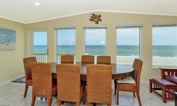 Why dine out with a view like this? The Ocean Sunrise property features a dining area with stunning ocean views.