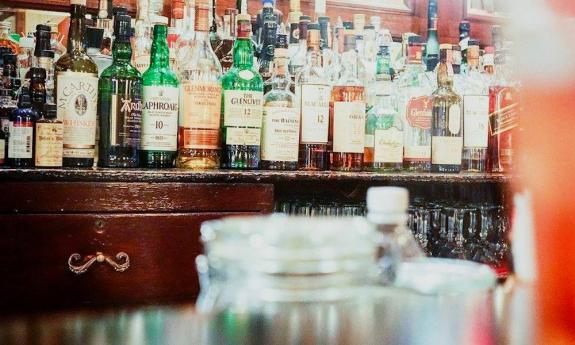 Bottles waiting to be poured at an Ancient City Bartending Co. mobile bar in St. Augustine, FL.