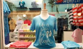 A mannequin displaying a beach shirt for sell