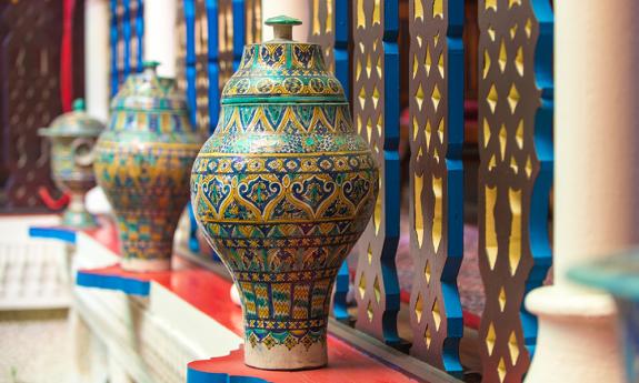 Vases that line the courtyard balcony 