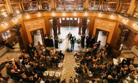 A wedded couple just after their vows in the Flagler College rotunda in St. Augustine. Photos by We Are the Bowsers Photography and Videography.