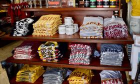Folded t-shirts at Flagler's Legacy Gifts store