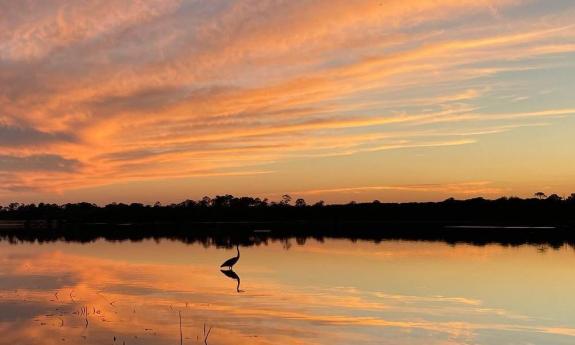 One view of the sunset from a Geo Trippin' sunset kayak tour.