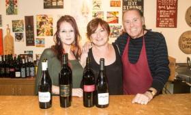 The team presenting wine at the Gifted Cork & Gourmet in St. Augustine.
