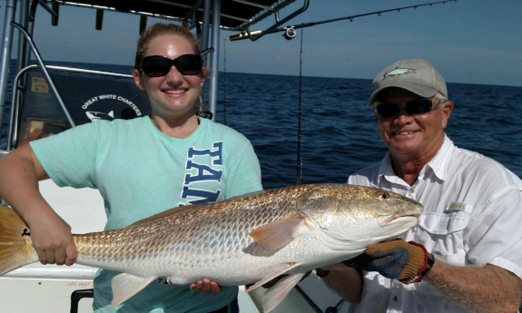 Captain David Ballard and a guest onboard