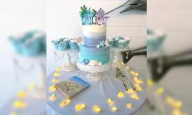 A cake themed for a beach wedding at Guy Harvey Resort St. Augustine Beach.