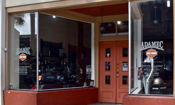 The storefront of Adamec Harley-Davidson on St. George Street