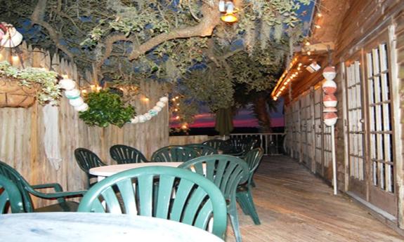 A dining area on the deck of the Salt-Water Cowboys in St. Augustine.