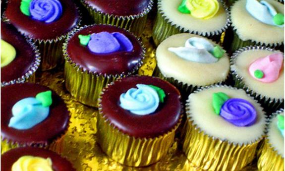 Decorated chocolate and vanilla frosted cupcakes